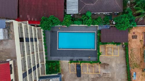 an overhead view of a stadium with a blue field at vangvieng THAVIKUN HOTEL in Vang Vieng