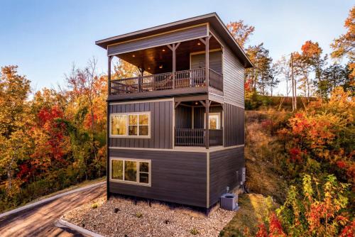 a rendering of a house in the woods at Open Skydeck with Spectacular View and Hot Tub in Sevierville