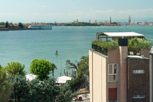 a view of the water from a building at Meliá Venezia Lido in Venice-Lido