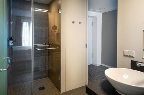 Et badeværelse på INNSiDE by Meliá Dresden
