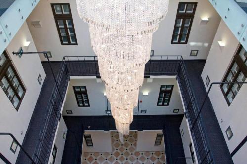 an overhead view of a large chandelier in a building at Hotel President Budapest, Affiliated by Meliá in Budapest