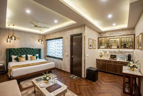 a bedroom with a large bed in a room at Hotel Donland in Gwalior