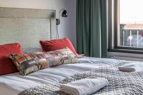 Cama ou camas em um quarto em Green Hotel