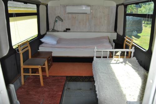 Ліжко або ліжка в номері Glampingbus