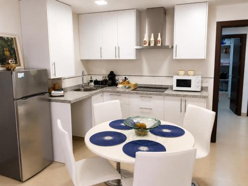a kitchen with a table with a bowl on it at Aire de sierra in Monachil