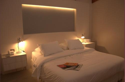 Katil atau katil-katil dalam bilik di Hotel Puerto de Vega