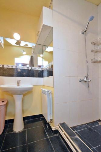 a bathroom with a sink and a mirror at Villa in the center of Yerevan in Yerevan