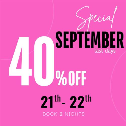 a pink poster with the words special september off at 22CAP apartment in Milan