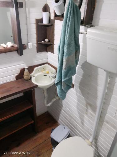a bathroom with a sink and a toilet at Dali in La Pedrera