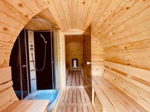 an inside view of a wooden sauna at Double room, sauna, Masuria in Ruciane-Nida