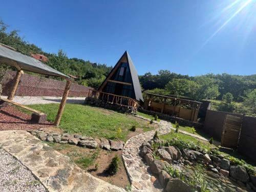 a view of a triangular house with a garden at Hayrapet Asatryan in Arzakan