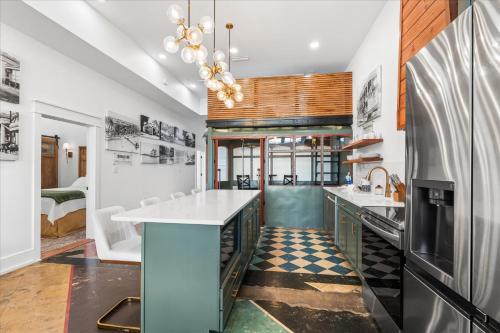 a kitchen with a large island in the middle at Downtown Mobile Pets Ok Walkable Secure Parking in Mobile