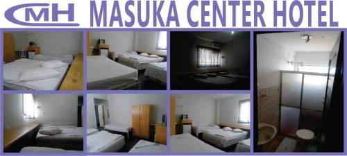 Cama o camas de una habitación en Masuka Center Hotel
