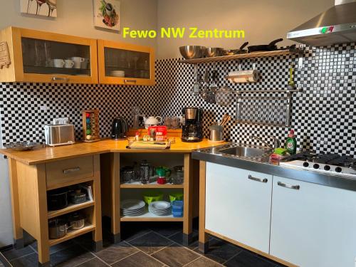 a kitchen with a sink and a counter top at Holiday il Macellaio - nur 5 Min vom Marktplatz in Neustadt an der Weinstraße