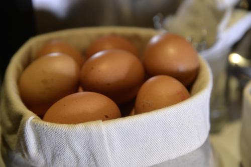 a basket filled with brown eggs on a table at Best Western Hotel Armando in Verona