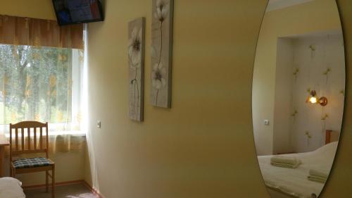 Postel nebo postele na pokoji v ubytování Sõrve Guest House