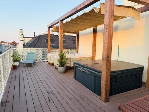 Rooftop Hideaway mit Whirlpool & Panorama