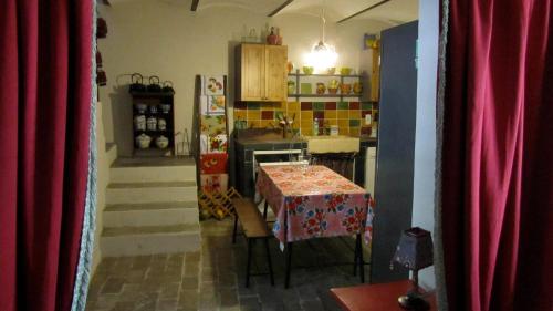 Reštaurácia alebo iné gastronomické zariadenie v ubytovaní Maison d'Hôtes La Boca