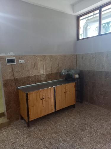 a room with a counter and a window on a wall at Hotel Anari in Sik't'arva
