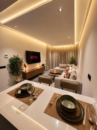 a kitchen with a living room with a couch at Elegant Studio in Casablanca in Casablanca