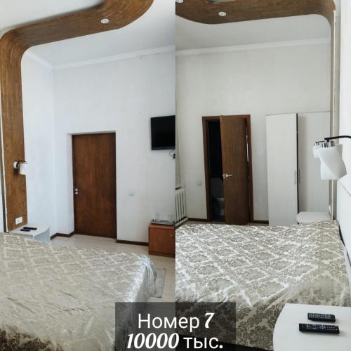a bedroom with a bed and a tv on the wall at Швейцария in Karataldy