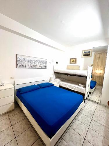 a bedroom with two beds in a room at Residence Regni in Senigallia
