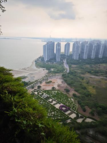 a view of a city with a body of water at Forest City Eco Stay in Gelang Patah