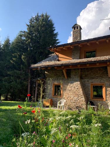 Dārzs pie naktsmītnes Chalet Angelo