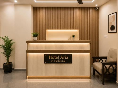 a hotel office with a sign that reads hotel atria at Hotel Aria Bhopal Near AIIMS Hospital & Rani Kamlapati Station in Bhopal