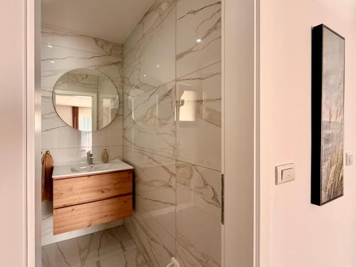 a bathroom with a sink and a mirror at Kuća za odmor Bruna in Livno