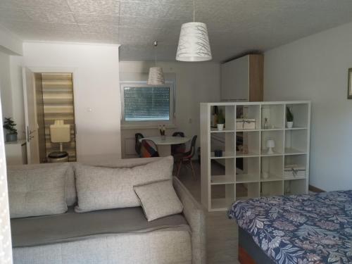 a living room with a couch and a table at Jakov & David in Gospić