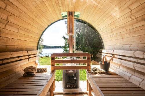 an inside view of a sauna with an open window at Historic lakeside villa - sauna, ski, boat, 20 guests in Sunnansjö