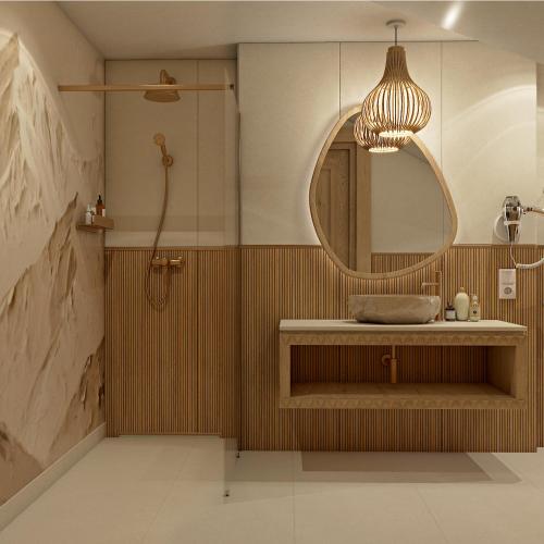 a bathroom with a sink and a mirror at Ku Dolinie in Kościelisko
