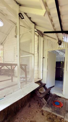 an empty room with a window in a house at Nomad house in Hin Kong in Ko Phangan