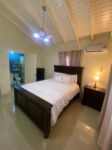 a bedroom with a large bed in a room at Winslow Place in Falmouth