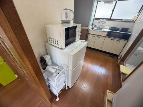 ハイツ本尾 203