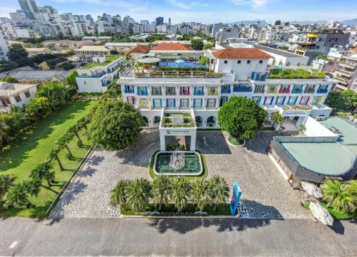 an aerial view of a house with a swimming pool at Risemount Premier Resort Da Nang in Danang