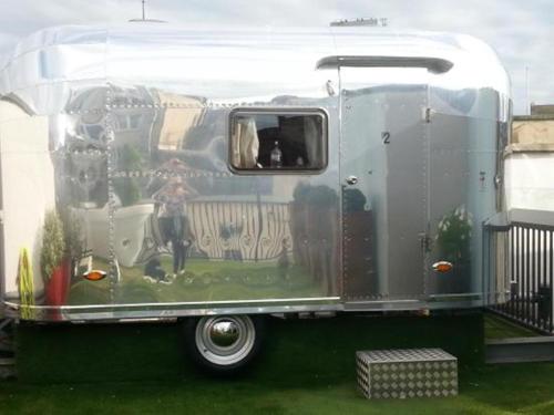 a silver trailer with a painting on the side of it at Brooks Guesthouse Bristol in Bristol