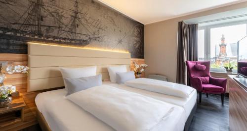 a hotel room with two beds and a window at PLAZA Premium Columbus Bremen in Bremen