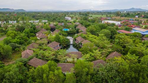 an aerial view of a village with houses and a river at Good Time Relax Resort in Kampot