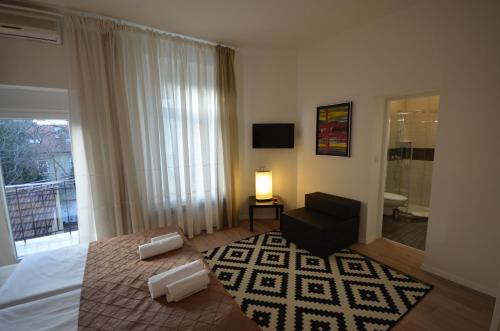 Posteľ alebo postele v izbe v ubytovaní Downtown Luxury Apartment