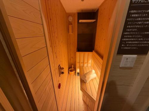 an overhead view of a small bathroom in a boat at Hotel Ayung 大人専用 in Sumoto