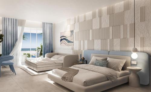 a bedroom with a bed and a couch at U North Coast in Sidi Kirayr