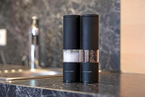 a bottle of lipstick sitting on a counter at Pritscheshof Ferienwohnung Terrasse in Malles Venosta