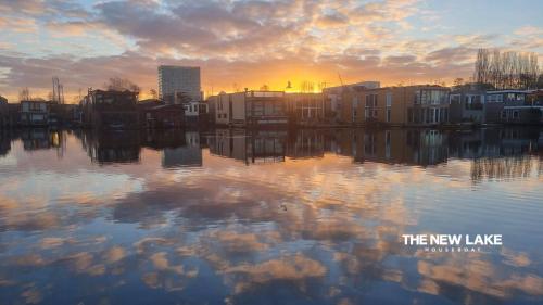 a view of the new lake at sunset at The New Lake Boathouse in Amsterdam