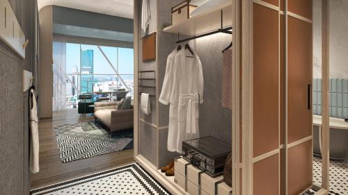 a hallway with a door leading to a living room at Hotel Indigo Ningbo by IHG in Ningbo