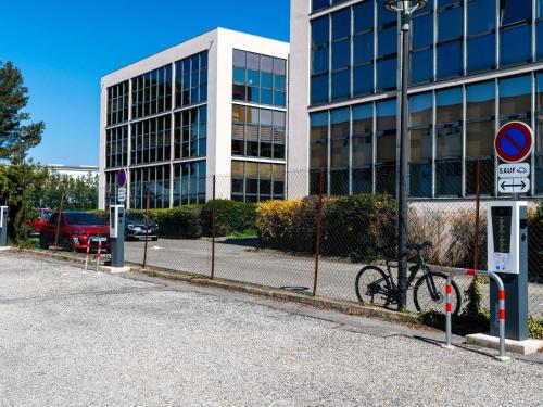 a bike parked in front of a building at ibis budget Aix en Provence in Aix-en-Provence