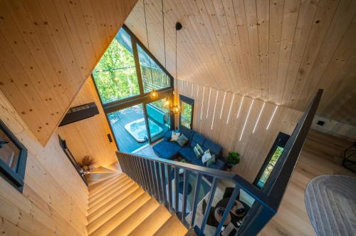 an overhead view of a living room with a blue couch at Green House - why not in Kismaros