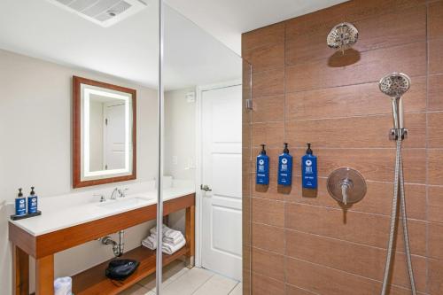 a bathroom with a shower and a sink at Margaritaville Vacation Club - St Thomas in Frydendal