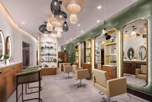 a salon with mirrors and chairs in a room at Hollywood Casino Aurora in Aurora